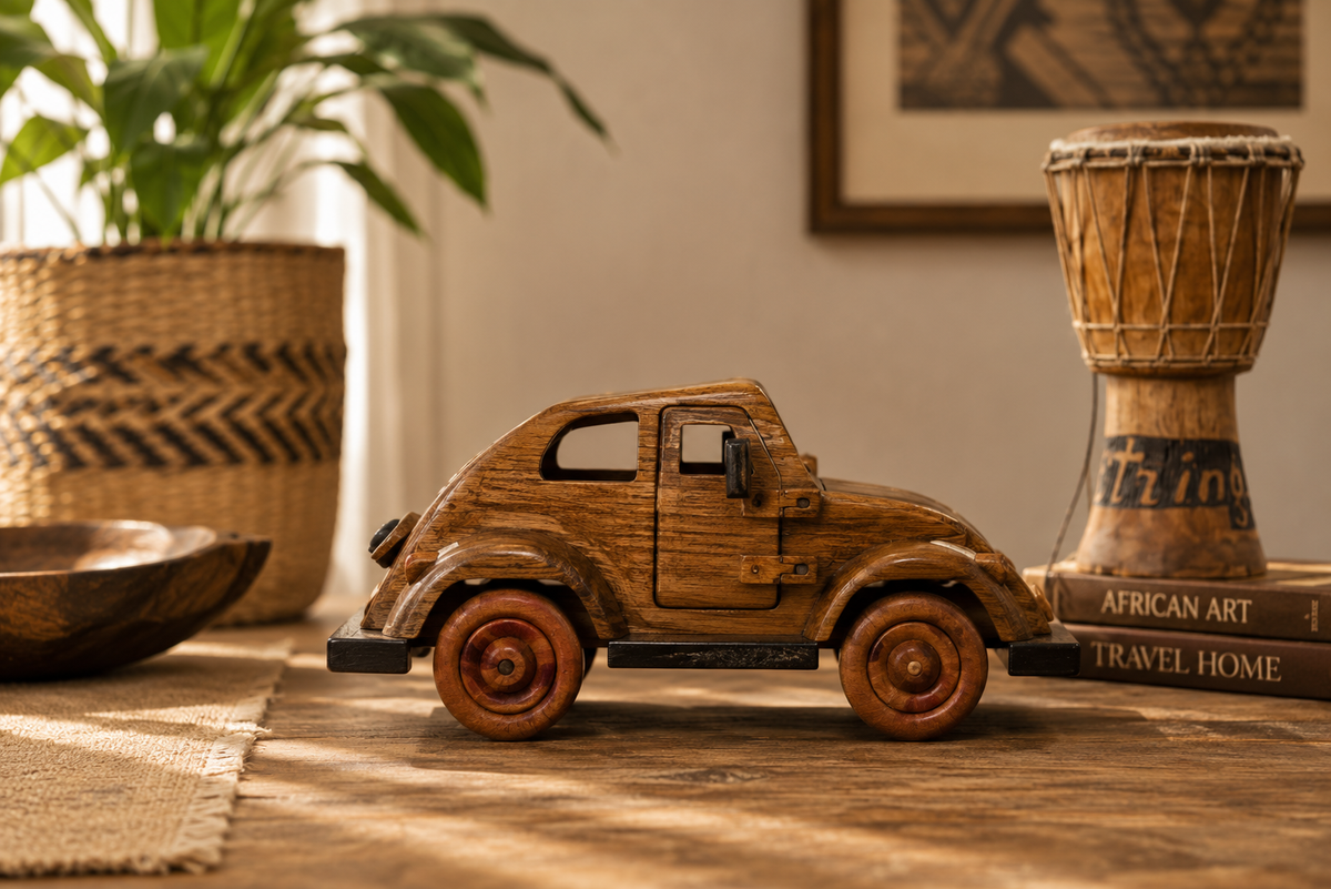 Handmade wooden Beetle car ornament with detailed wheels and natural wood finish