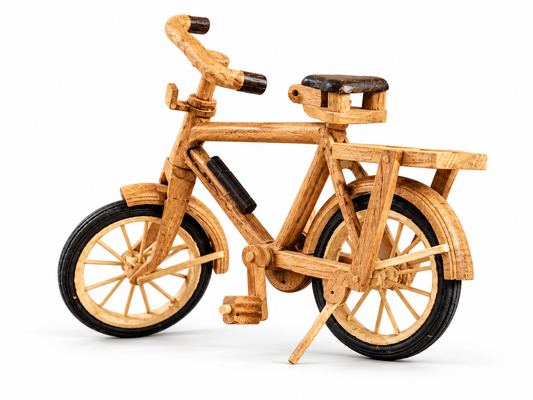 Handmade wooden bicycle ornament with spoked wheels, a rear rack and a kickstand, shown on a clean white background.
