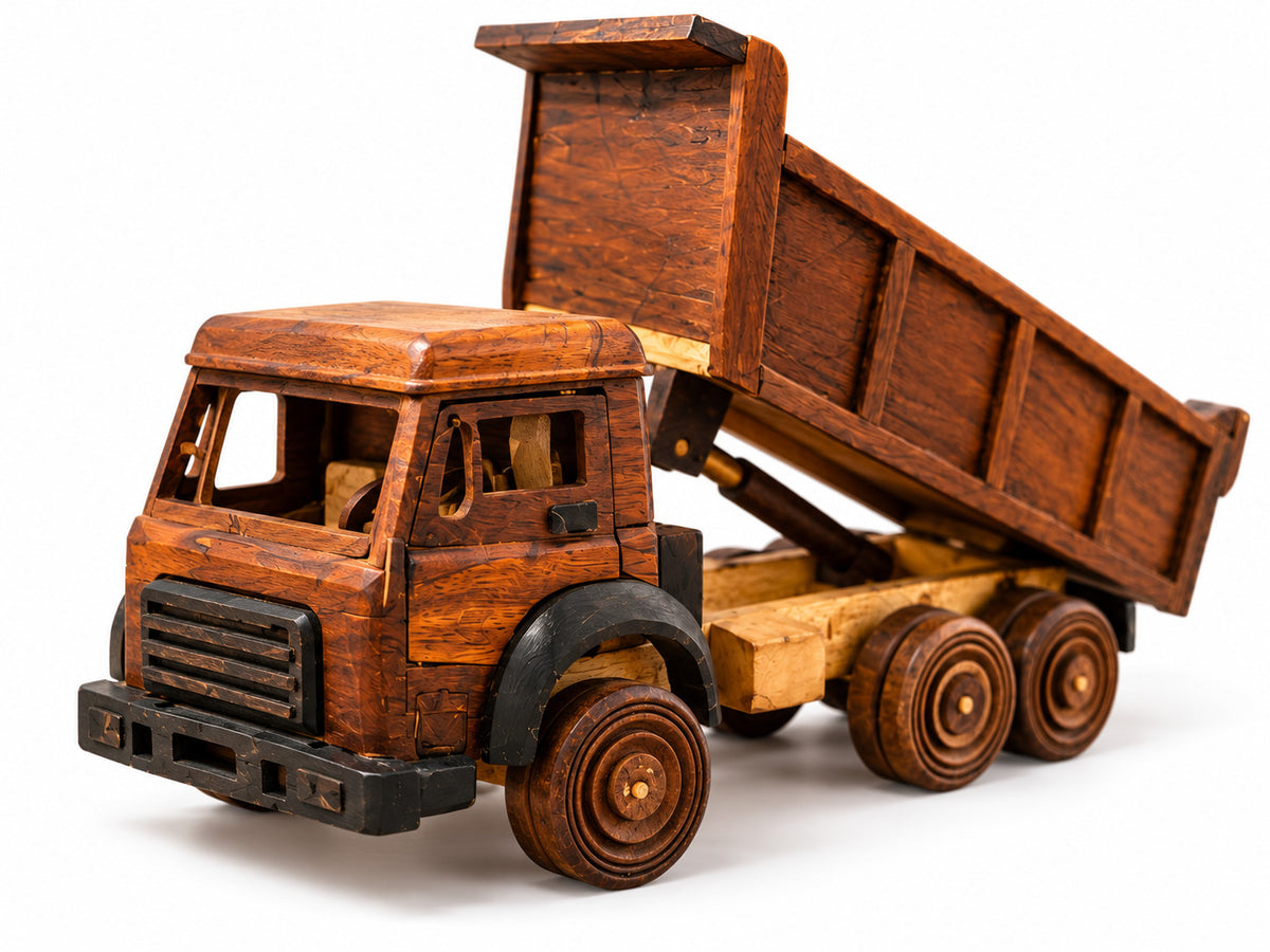 Handmade wooden dump truck viewed from the front, showing its grille, six wheels and raised tipping bed against a white background.